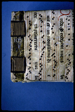 15th century longstitch binding with separate pierced supports and a cover of manuscript waste taken from a discarded liturgical book